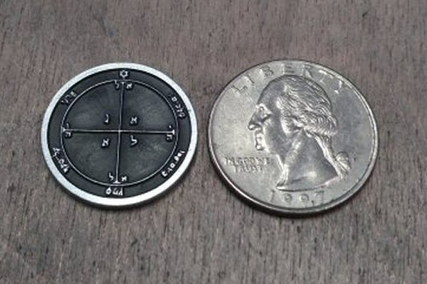 The coins are 1 sided and are over 22mm in diameter and almost 2mm thick, they are slightly smaller in diameter than a quarter.